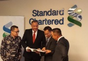 Laba bersih Standard Chartered naik 214% di kuartal I-2018