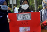 Devisa terkuras tipis, Bank Indonesia biarkan rupiah ambrol?