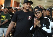 Suporter Indonesia yang ditahan polisi Malaysia tiba di Bali