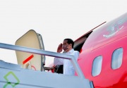 Jokowi beri modal ke pedagang yang bentangkan spanduk