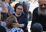 Kristen Gaza: Saya tidak akan meninggalkan gereja kecuali ke alam kubur