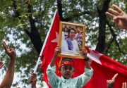 Aung San Suu Kyi dipindahkan dari penjara ke rumah karena cuaca panas