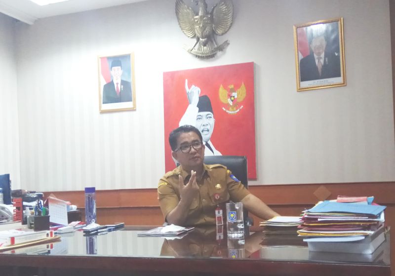 Pelaksana tugas (Plt) Direktur Jenderal Otonomi Daerah Kementerian Dalam Negeri Akmal Malik di kantornya. Alinea.id/Kudus Purnomo Wahidin.