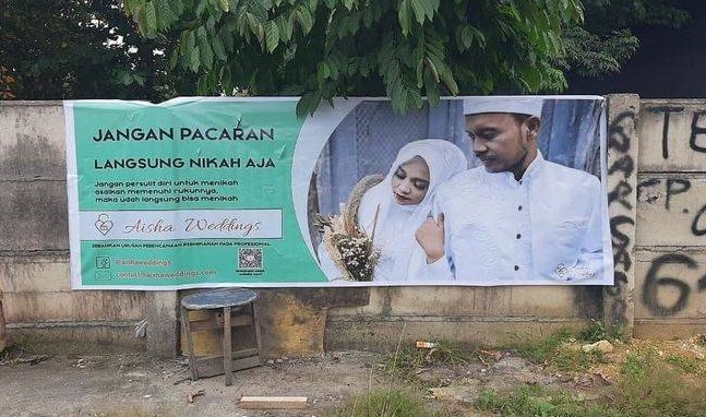 Spanduk kampanye pernikahan anak penyedia jasa Aisha Weddings. /Foto Twitter